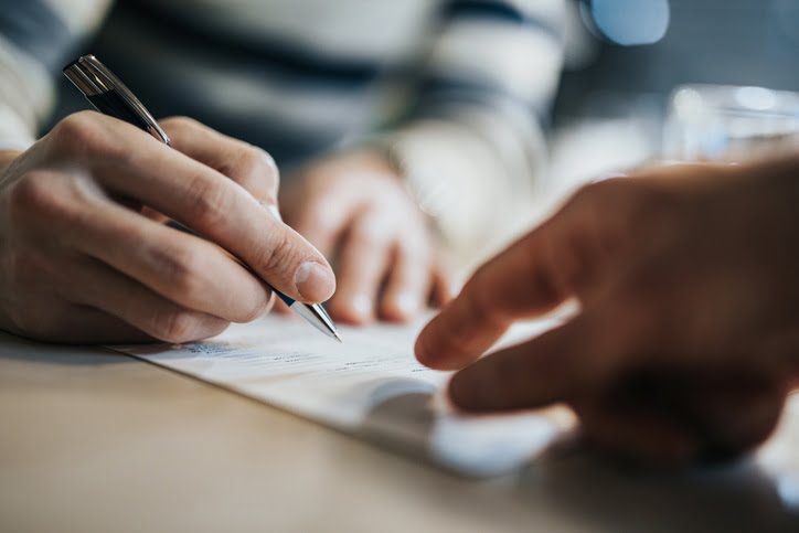 Person completing a form for Gastric Bypass Surgery