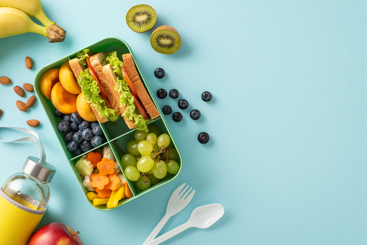 A healthy lunch box filled with colorful fruits and vegetables.